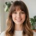 A professional hair how to style bangs guide featuring a woman with light brown wavy hair and a full fringe. The image includes circular inset photos of different bang styles and text listing styling options.