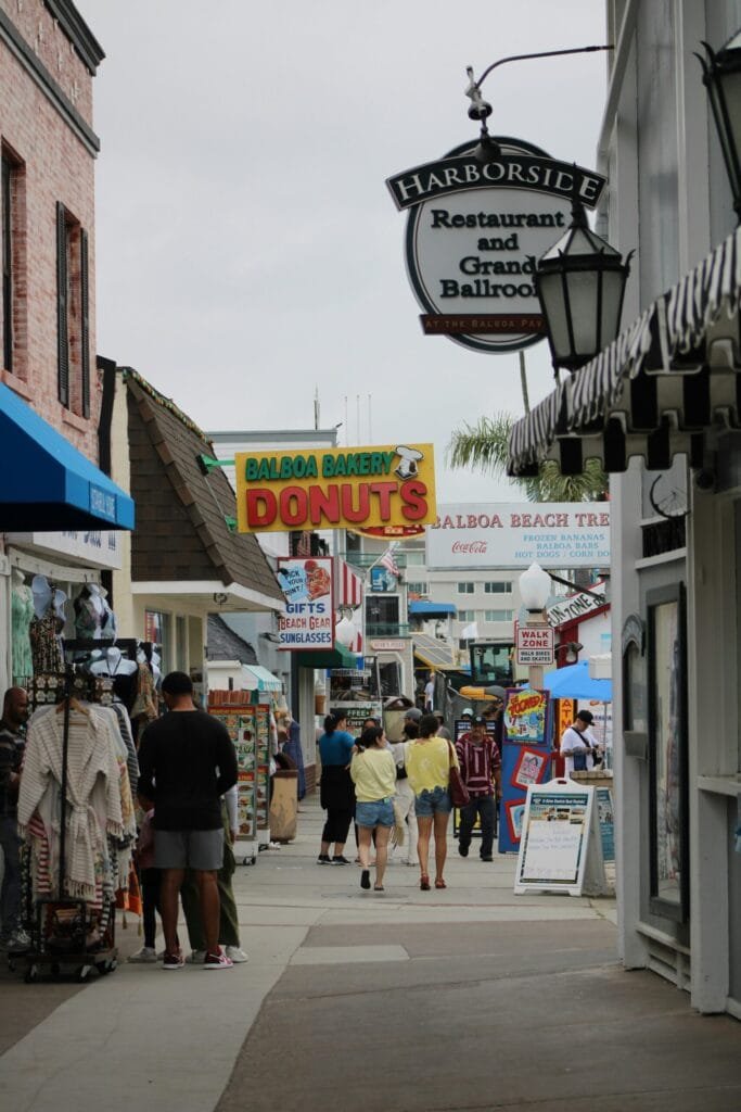 Pedestrians browsing local shops and eateries, showing top shoppings